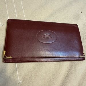 Cartier long bifold wallet.